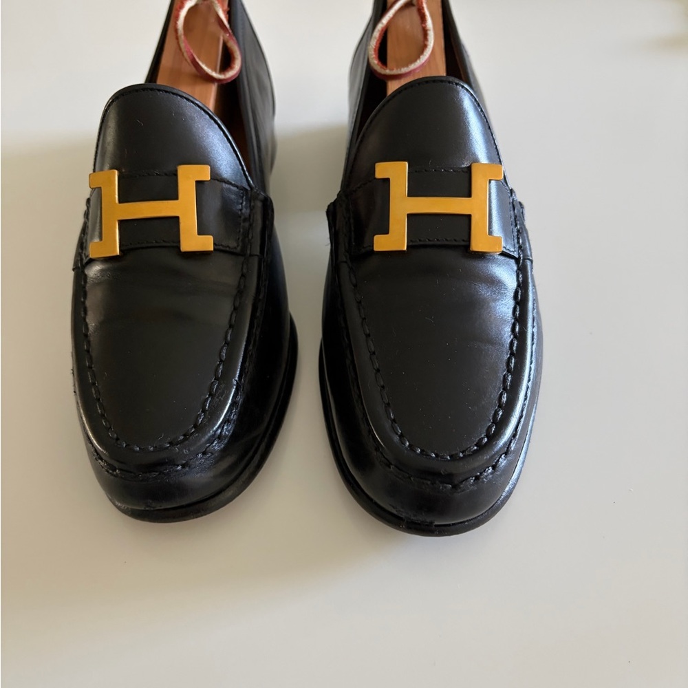 Hermes Black Loafers with Gold Detailing